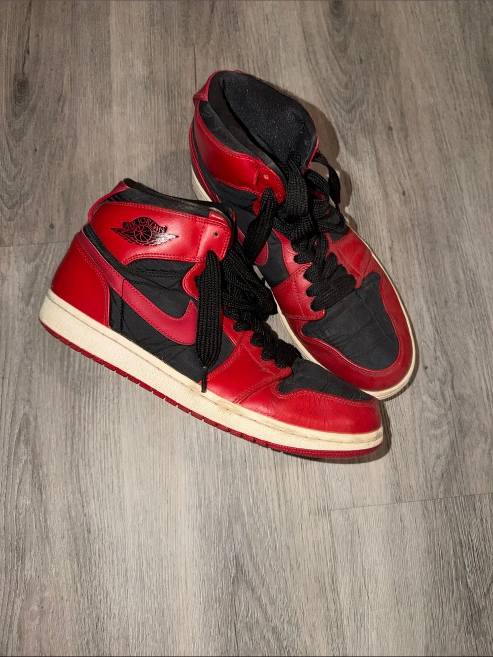 Jordans mid in Fire Red and Black